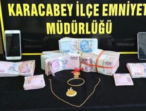 Yaşı kadının altınlarını ve yüklü miktarda parasını alan dolandırıcılar yakalandı